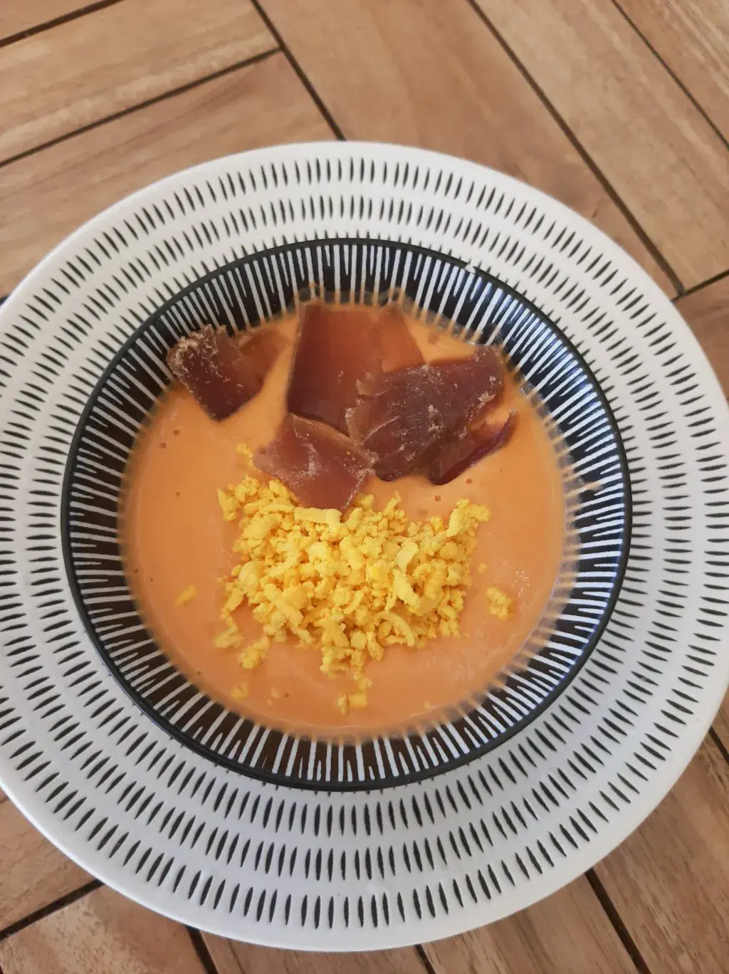 Salmorejo con mojama de atún Cold tomato soup topped with dried salted tuna